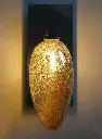 Applique bras miroir galet 01 Airain face switchon.webp